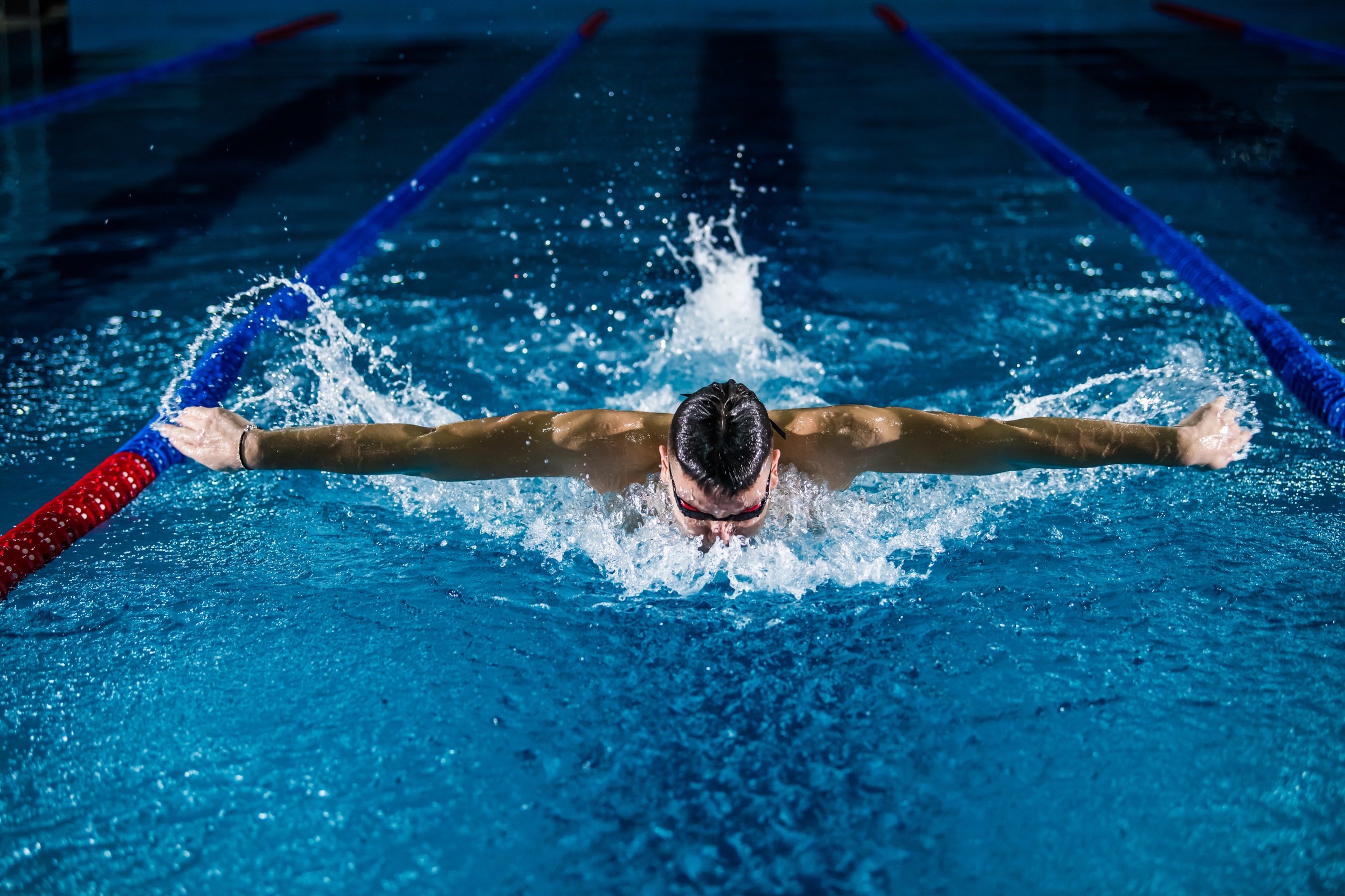 Man swimming in a swimming-pool